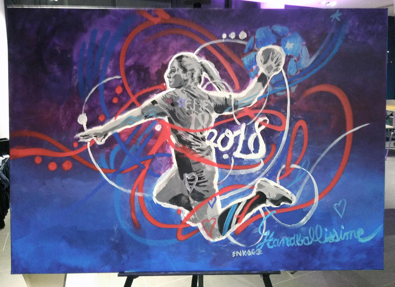 Performance de peinture en direct sur le thème du sport et du handball par l'artiste Enkage