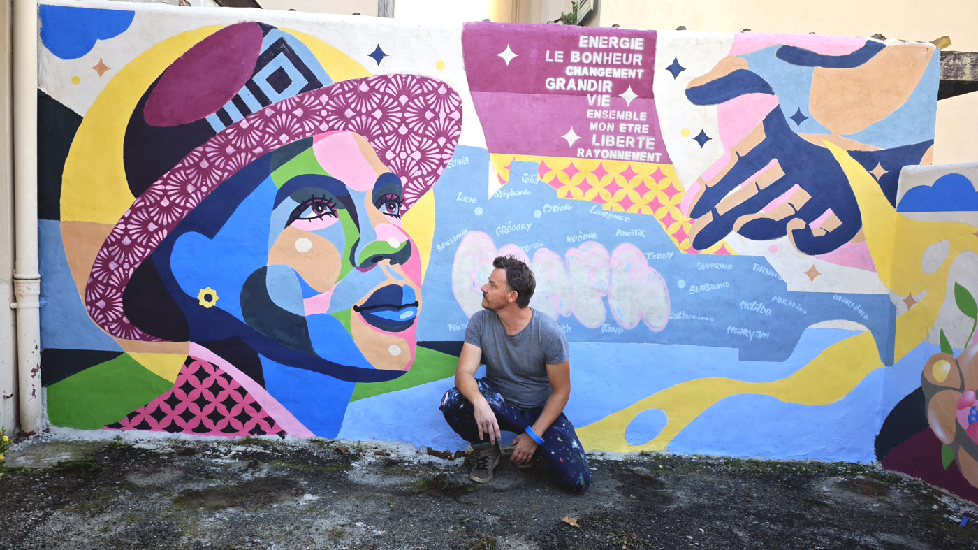 L’importance de l’humain, détail du visage peint sur la fresque street art collaborative